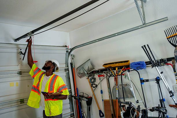 Professional Garage Door Panel Replacement technician working in Roessleville, NY
